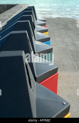 Coloured recycling bins at Marazion West Cornwall Individual bins provided for different types of rubbish plastics metal glass Stock Photo