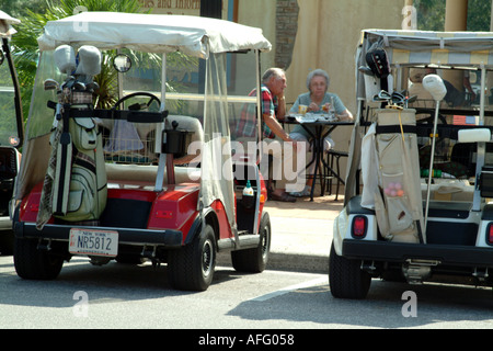 Golf Club Carts in Spanish Springs The Villages mid Florida fl USA outside cafe restaurant United States of America Stock Photo