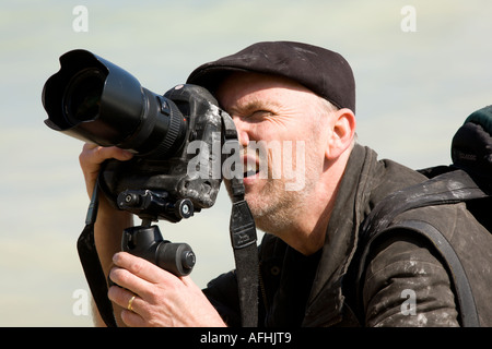 Photographer in action Stock Photo