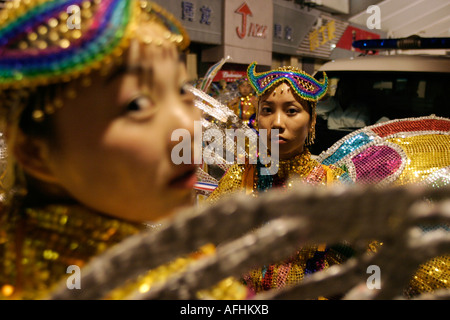 West Lake Expo, Hangzhou, China: Girl students dressed as butterflies prepare backstage to perform at the opening ceremony. Stock Photo