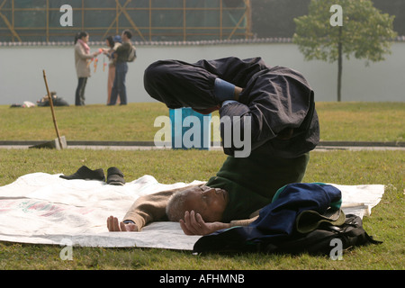 An old man doing exercises Stock Photo