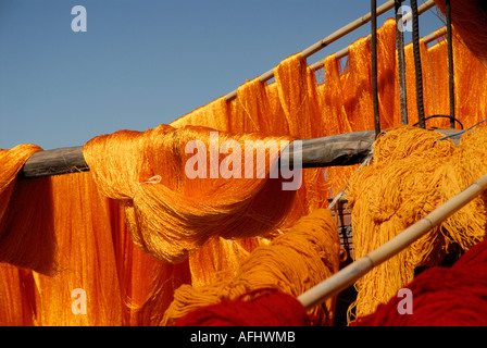 Coloured silks hanging out to dry in the Souk des Teinturiers the dyers souk northern Medina Marrakesh Marrakech Morocco North Stock Photo