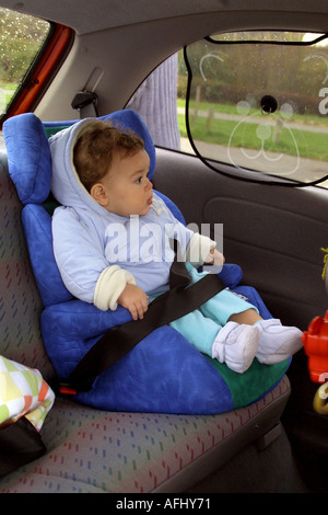 one year old child seated in a car seat Stock Photo Alamy