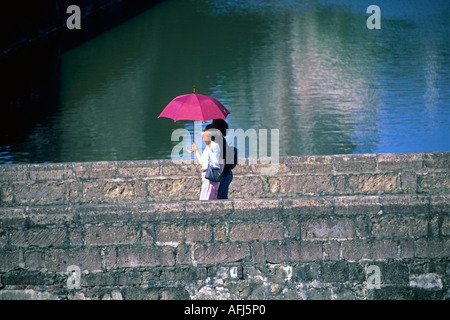 Tourists on bridge Fort Santiago Intramuros Manila Philippines Stock Photo