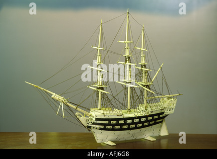 Scrimshaw whalebone ivory art. Carved model of whaliScng ship in the Whaling Museum, Nantucket, off Cape Cod, Massachusetts, USA Stock Photo