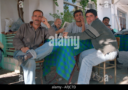 Older men sitting in small rural village in South Western Turkey. Stock Photo