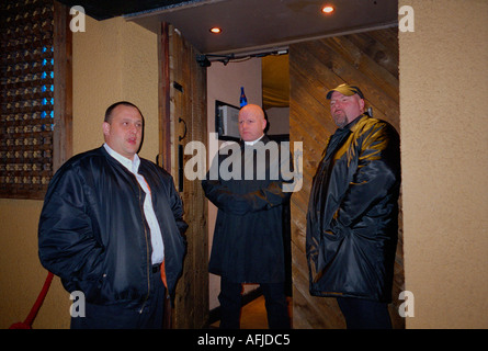 Bouncers on the door at nightclub entrances Stock Photo - Alamy