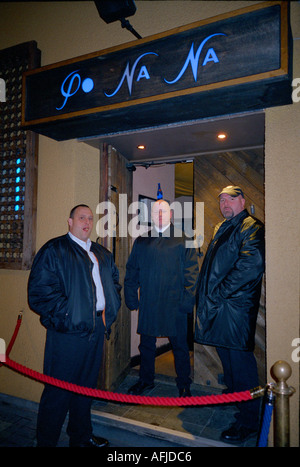 Bouncers on the door at nightclub entrances Stock Photo - Alamy