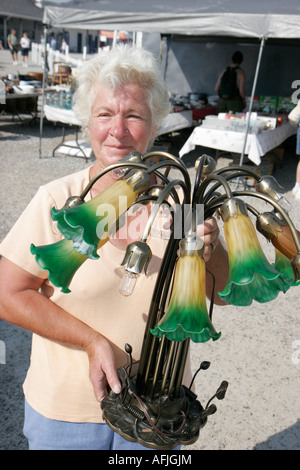 Shipshewana Indiana,Shipshewana Flea Market,senior seniors citizen citizens,woman female women,collectible lamp,IN070829037 Stock Photo