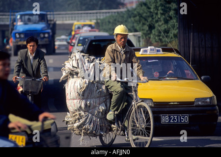 Cyclist and traffic in Beijing, China Stock Photo