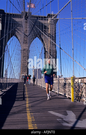 Joggers Brooklyn Bridge New York City USA Stock Photo