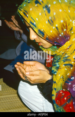 Peckham Mosque Woman Praying With Prayer Beads Ramadan Stock Photo