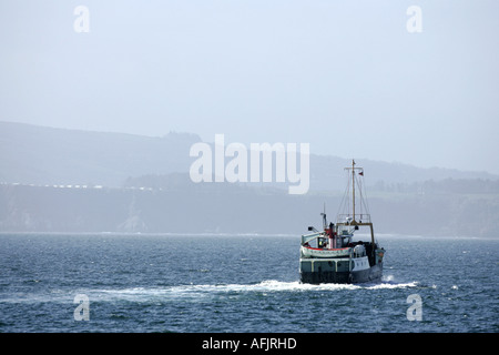 Caledonian MacBrayne MV Raasay  ferry sails off to Ballycastle from Rathlin Island northern ireland Stock Photo