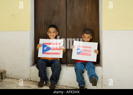 Boys holding drawing of the Puerto Rican flag. Stock Photo