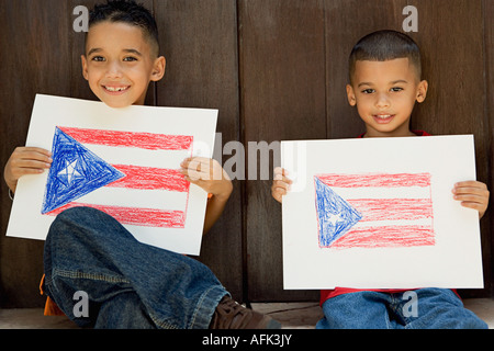 Boys holding drawing of the Puerto Rican flag. Stock Photo