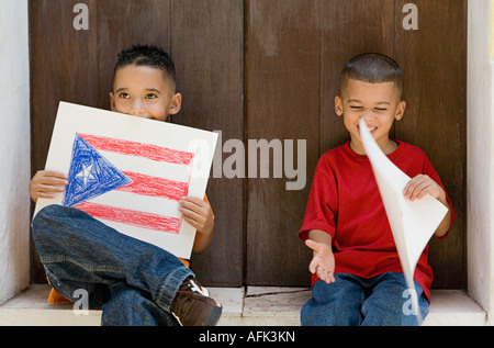 Boys holding drawing of the Puerto Rican flag. Stock Photo