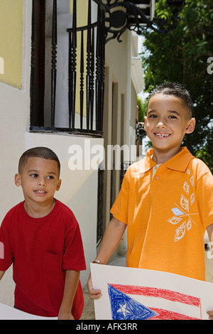 Boys holding drawing of the Puerto Rican flag. Stock Photo