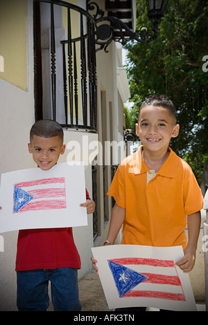 Boys holding drawing of the Puerto Rican flag. Stock Photo