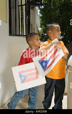 Boys holding drawing of the Puerto Rican flag. Stock Photo