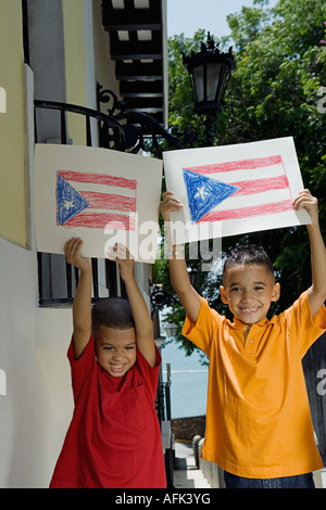 Boys holding drawing of the Puerto Rican flag. Stock Photo