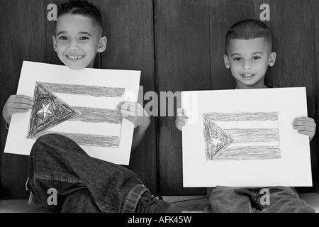 Boys holding drawing of the Puerto Rican flag. Stock Photo