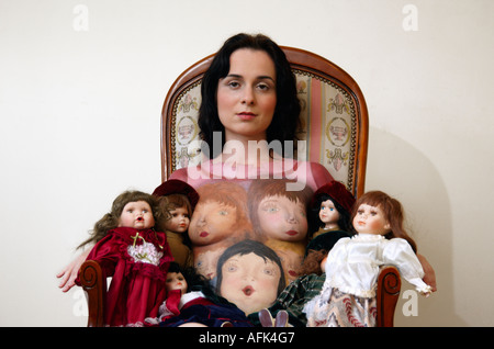 Body art female model with porcelain dolls