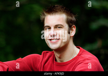 Portrait of smiling young Caucasian man Stock Photo