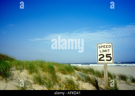 25mph speed limit sign on sand dunes in the Outer Banks of North Carolina USA Stock Photo