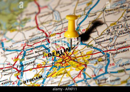 Map Pin pointing to Berlin on a road map Stock Photo