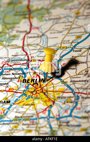 Map Pin pointing to Berlin on a road map Stock Photo