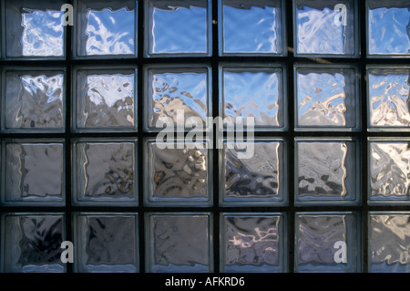 Blue sky through a glass wall. Stock Photo