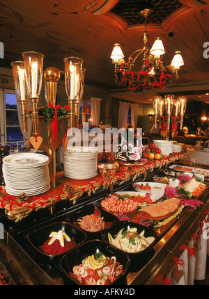 Christmas buffet or julbord at Stallmastaregarden, the oldest restaurant in Stockholm, Sweden Stock Photo