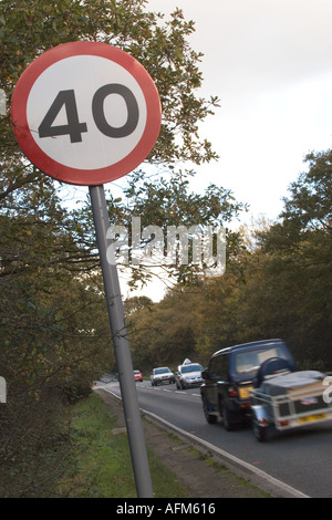 Cars Passing Speed Limit Sign Stock Photo - Alamy