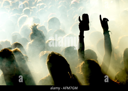 Revellers watch Squarepusher through a smokey haze at the 2007 Glade Electronic Music Festival in Aldermaston, Berkshire. Stock Photo