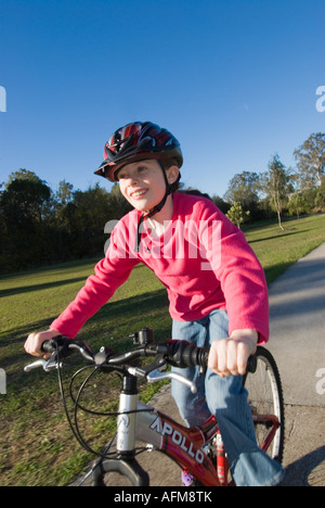 9 year old girl on a bicycle, Brisbane, Australia Stock Photo