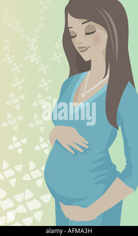 Pregnant woman touching her abdomen Stock Photo