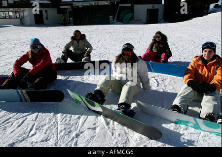 Girl snowboarders take a lesson, Avoriaz, Portes de Soleil, Alps, France, Europe Stock Photo