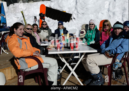 Snowboarders eat lunch at a mountain cafe, Avoriaz, Alps, France, Europe Stock Photo