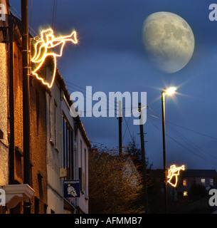 Urban Angel with moon Stock Photo