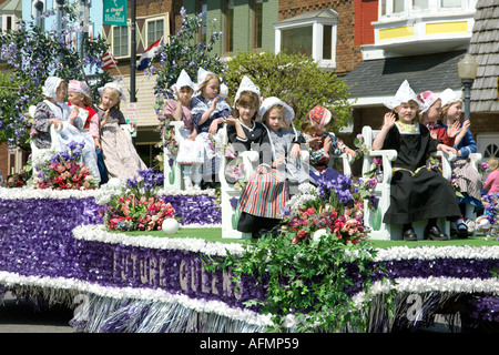 A parade float with young Dutch children at Tulip Time in Pella, Iowa USA Stock Photo