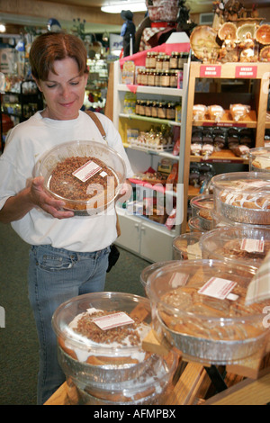 Indiana Elkhart County,Middlebury,Das Dutchman Essenhaus,Amish bakery,woman shops,pecan rolls,visitors travel traveling tour tourist tourism landmark Stock Photo