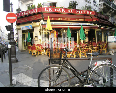 early morning scene at roadside cafe Le Bar au Metre in Boulevard Voltaire Paris France Stock Photo