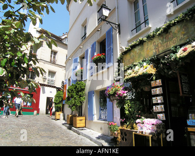 street scene with picturesque restaurants  at corner of Rue Norvins Montmartre Paris France Stock Photo