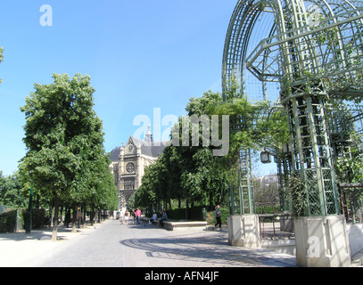 Architectural detail of ironwork and gardens near Forum des Halles with St Eustache church in the background  Paris France Stock Photo