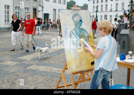 artist at work at Wijngaard square in centre of Thorn Limburg Netherlands Stock Photo