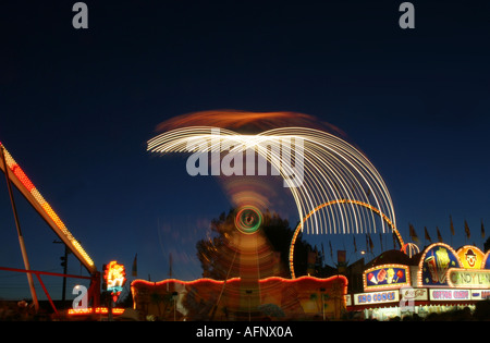 CARNIVAL RIDES    Night time on the midway at the Calgary Stampede fairgrounds, Calgary, Alberta, Canada Stock Photo