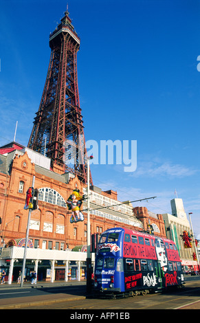 Blackpool Tower and traditional historic electric tram on the sea front at the seaside resort of Blackpool, Lancashire, England Stock Photo