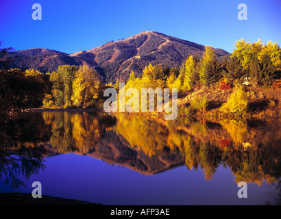 USA Idaho Resort Town of Sun Valley Fall scenic of Trail Creek Pond and reflection of Baldy Mountain ski area Stock Photo