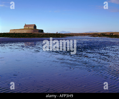 St Cwyfan's Church seen over Porth Cwyfan, near Aberffraw, Aberffraw Bay Heritage Coast, Anglesey, North Wales, UK. Stock Photo