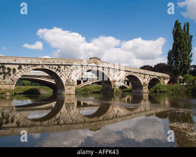 ATCHAM OLD STONE BRIDGE over River Severn in summer Shropshire England UK Stock Photo